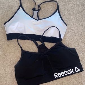 Large PINK sports bra and medium Reebok sports bra